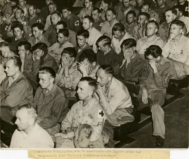 Nazi soldiers watch concentration camp footage