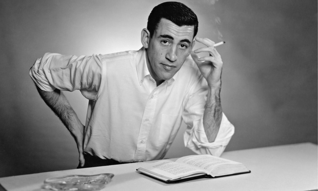 Author JD Salinger poses for a portrait as he reads from his novel The Catcher in the Rye in 1952.